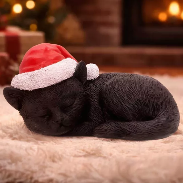 Vánoční ozdoba Jingle Paws - Sleeping Black Cat in Santa Hat (Nemesis Now) - Nemesis Now 
